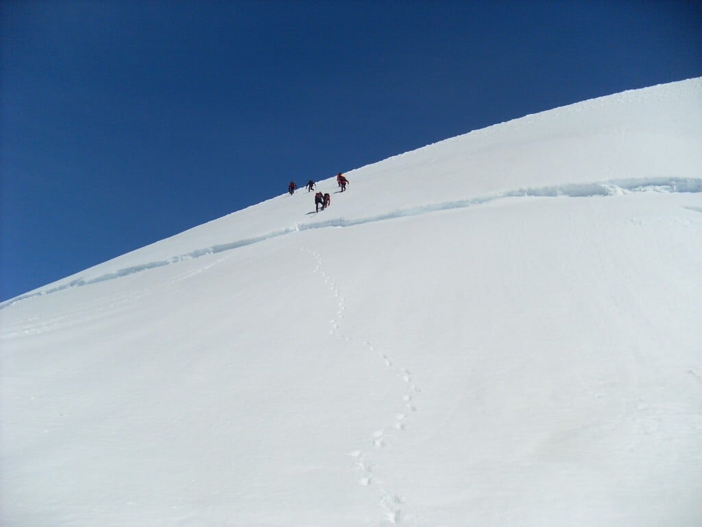 Crossing a crevice in Vatnajokul glacier - coming down from Hrutfjallstindar peaks