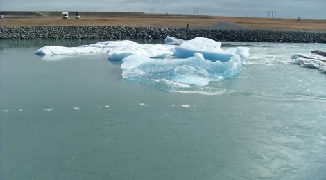 Icebergs drift down the small river that runs from the lagoon to the Atlantic ocean.
