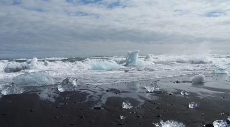 The waves of the North Atlantic hurl icebergs on to the south of the Jökulsárlón beach.
