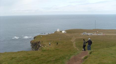 In the far distance is the light house at Látrabjarg.