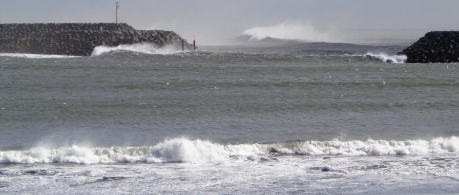 The waves of the North Atlantic Pound the Icelandic Coast at Landeyjarhöfn harbour