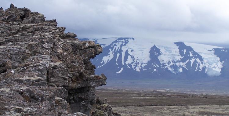 Gargoyles at Strýtur at the edge of the Kjalhraun lava field, The Langjokull glacier in the background.