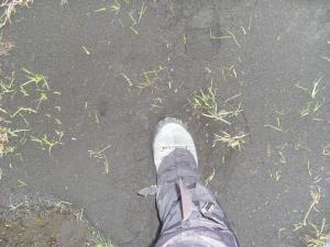 Stepping in thick layer of ash near the Eyjafjallajokull glacier. 