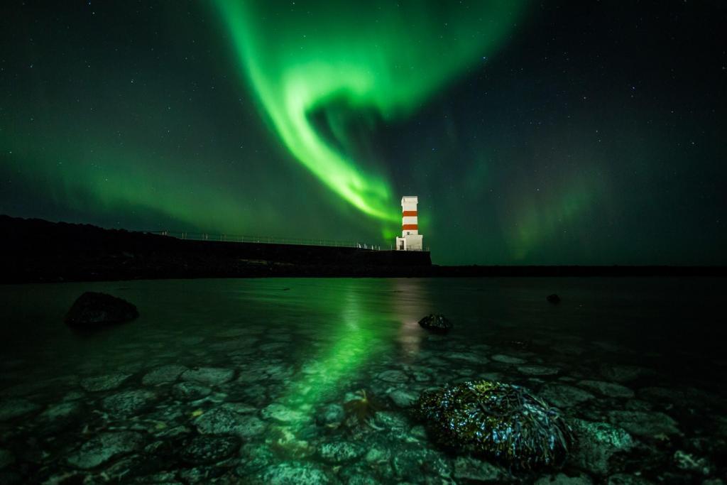 The Northern Lights Above Gardskagaviti Lighthouse.