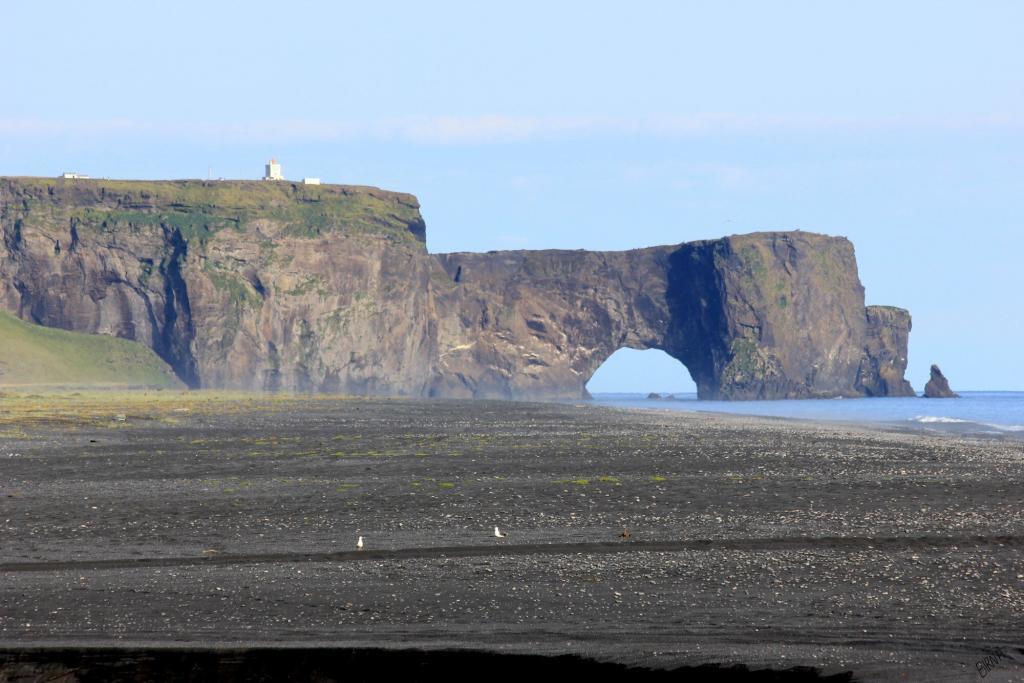 Dyrholaey with lighthouse on top.