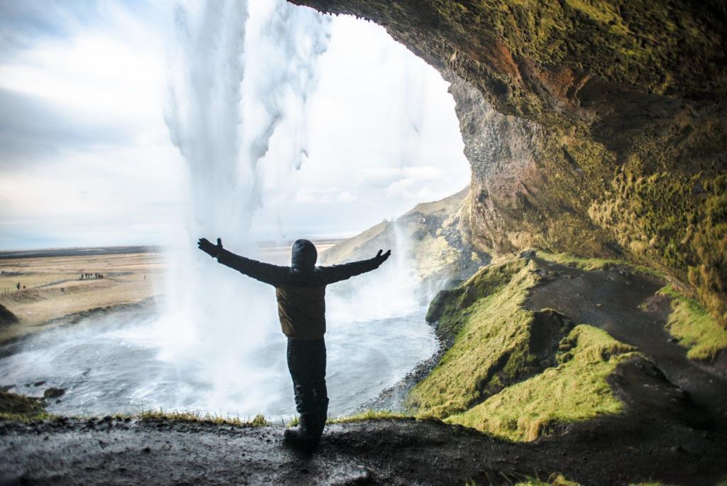 Behind Seljalandsfoss waterfall. 