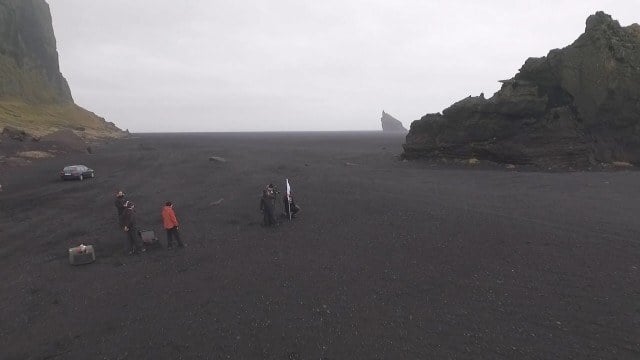 Filming on the black beach.