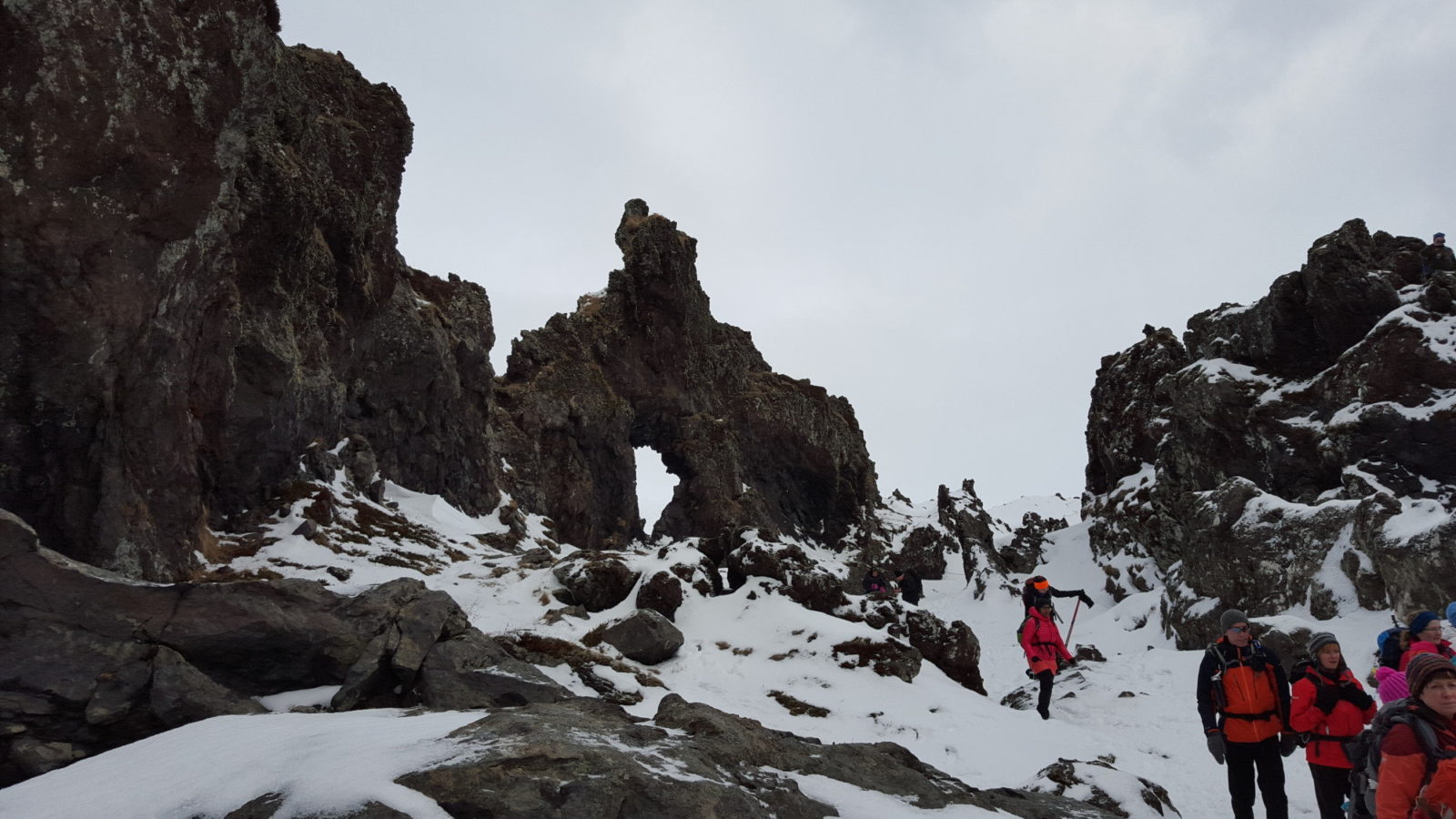 Walking past Gatklettur. Or the rock with the hole in it. Or something.