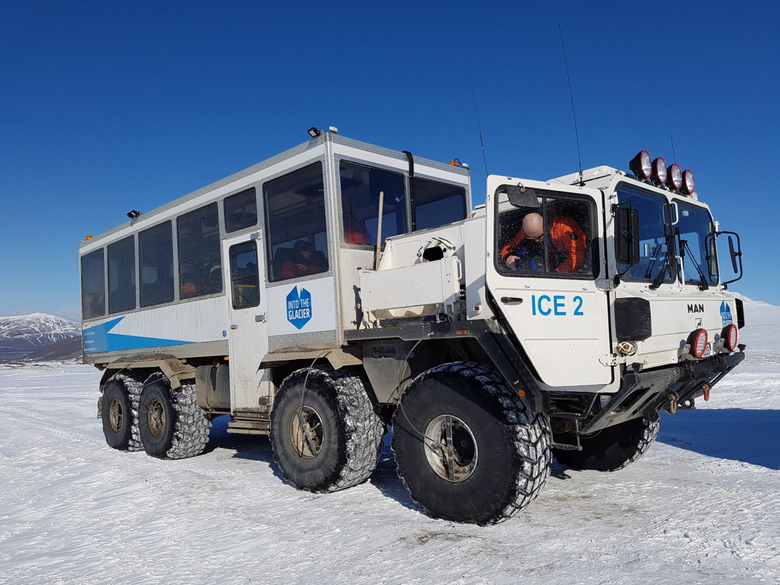 Take a ride with this truck to the top of the glacier and then descend right down to its heart. 
