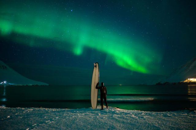The northern lights show you the way to the surf. Photo by Chris Burkard.