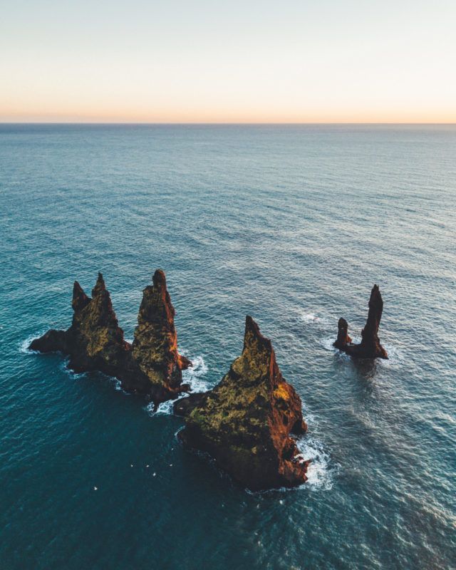 The Reynisdrangar sea stacks by the black beach.