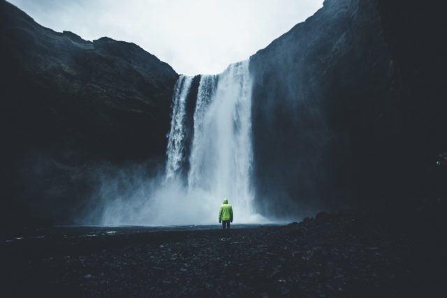 Skógafoss waterfall is a popular destination on a road trip in Iceland.