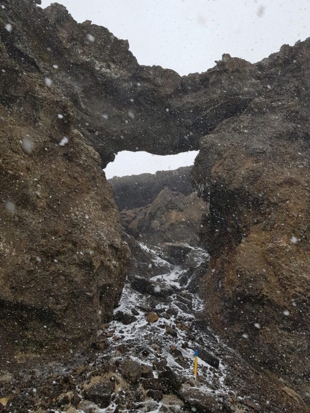 Cool rock formations and snowstorm in the Ölfusvatnsgljúfur canyon in Iceland.