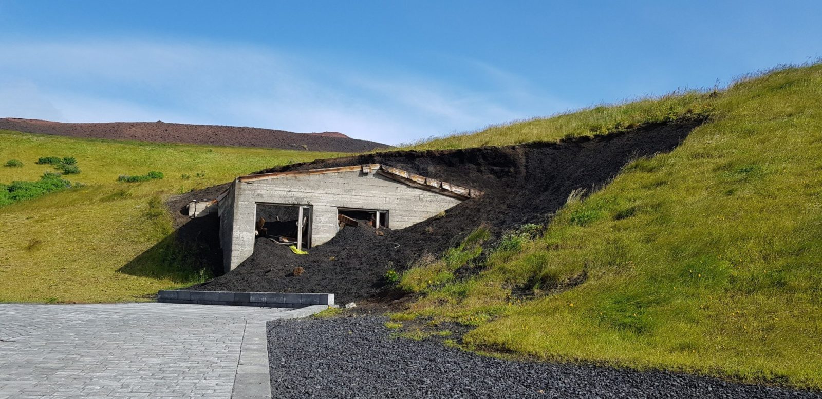 A house buried in volcanic material from the 1973 Westman Island eruption partially excavated.