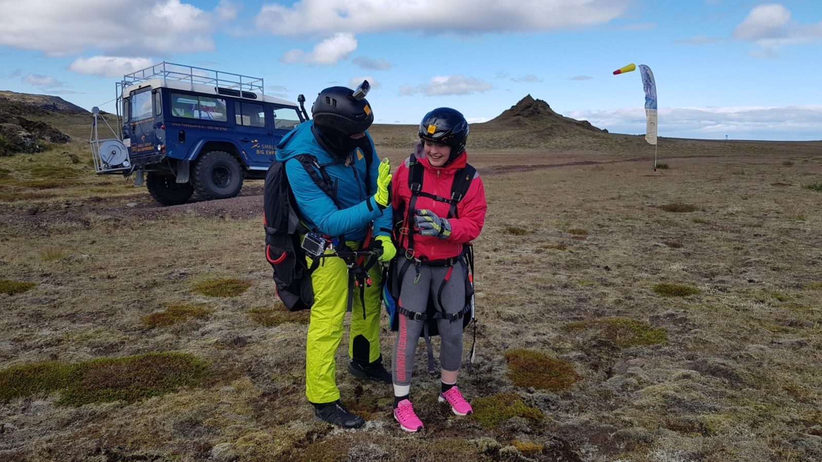 Getting ready to soar with tandem paragliding. "Launch vehicle" in the background!