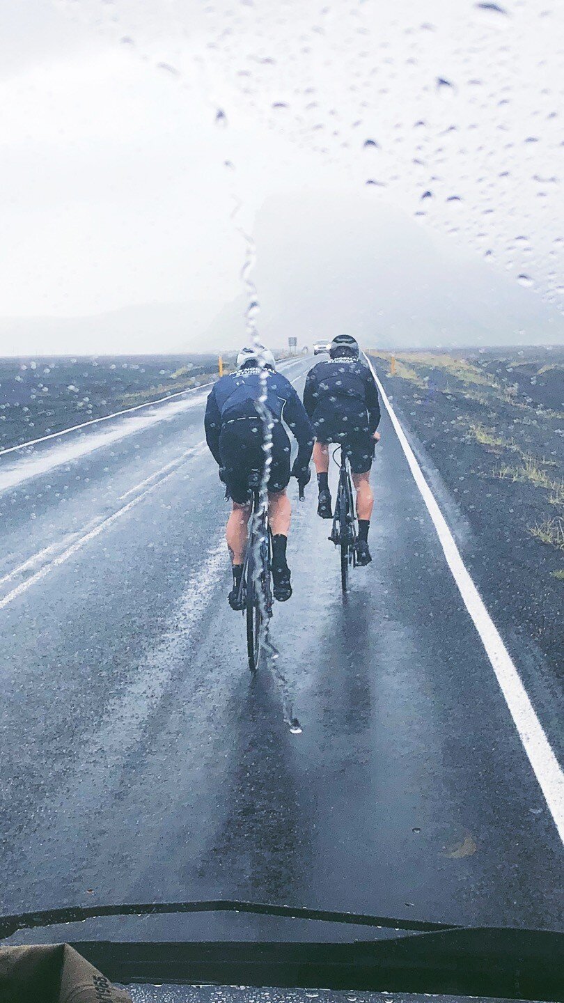 Cyclists in the rain in Iceland.