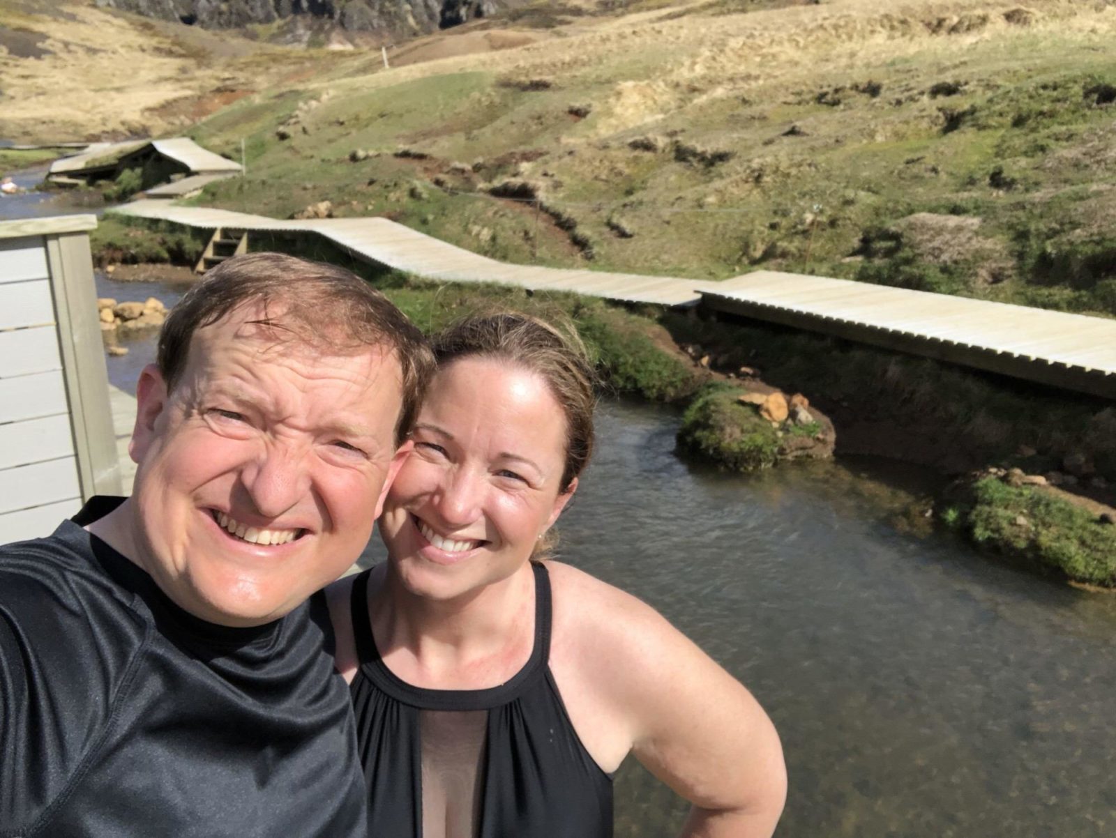 A couple in Reykjadalur in Iceland.