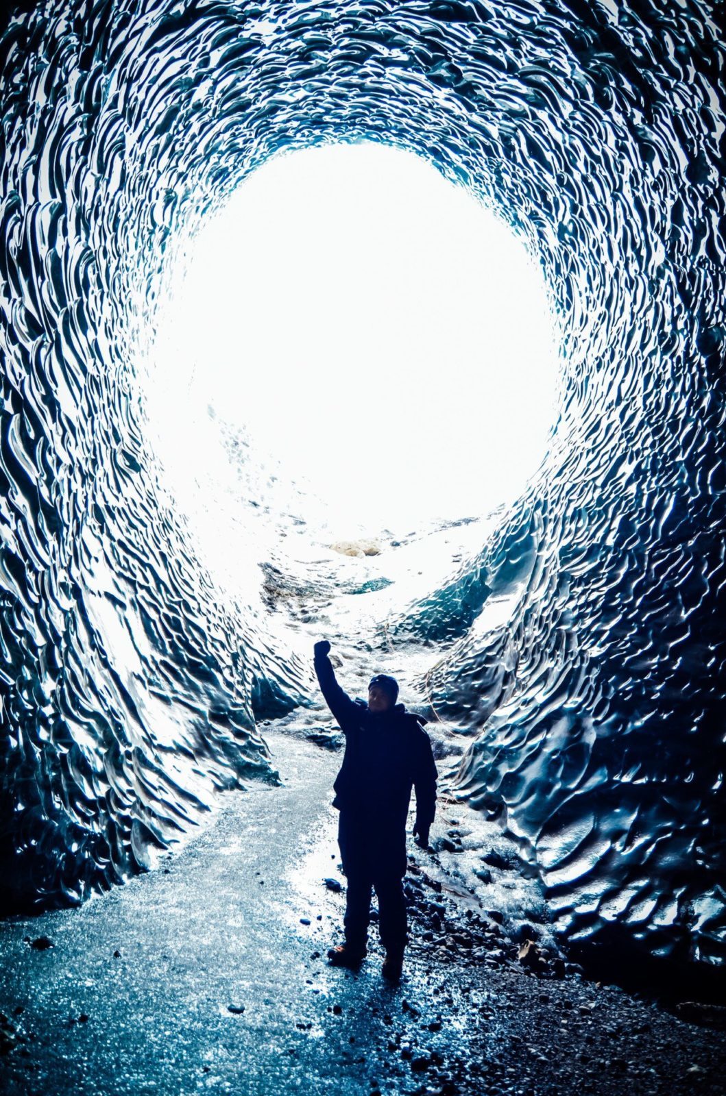 Man inside an ice cave in Iceland