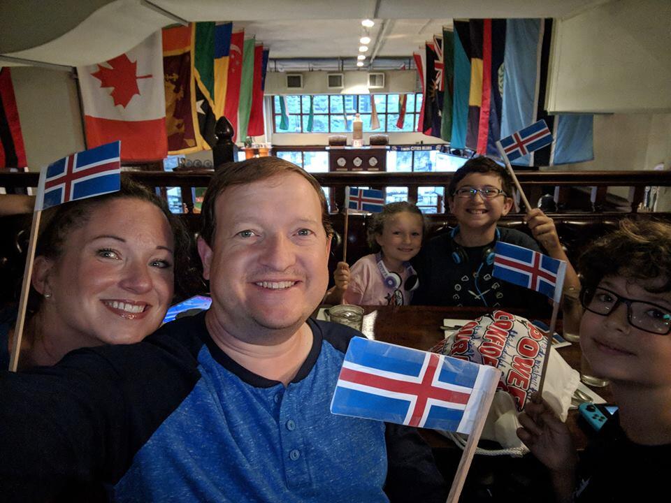 Family with Icelandic flags 