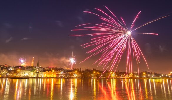 Reykjavik is illuminated by fireworks on New Year's Eve.