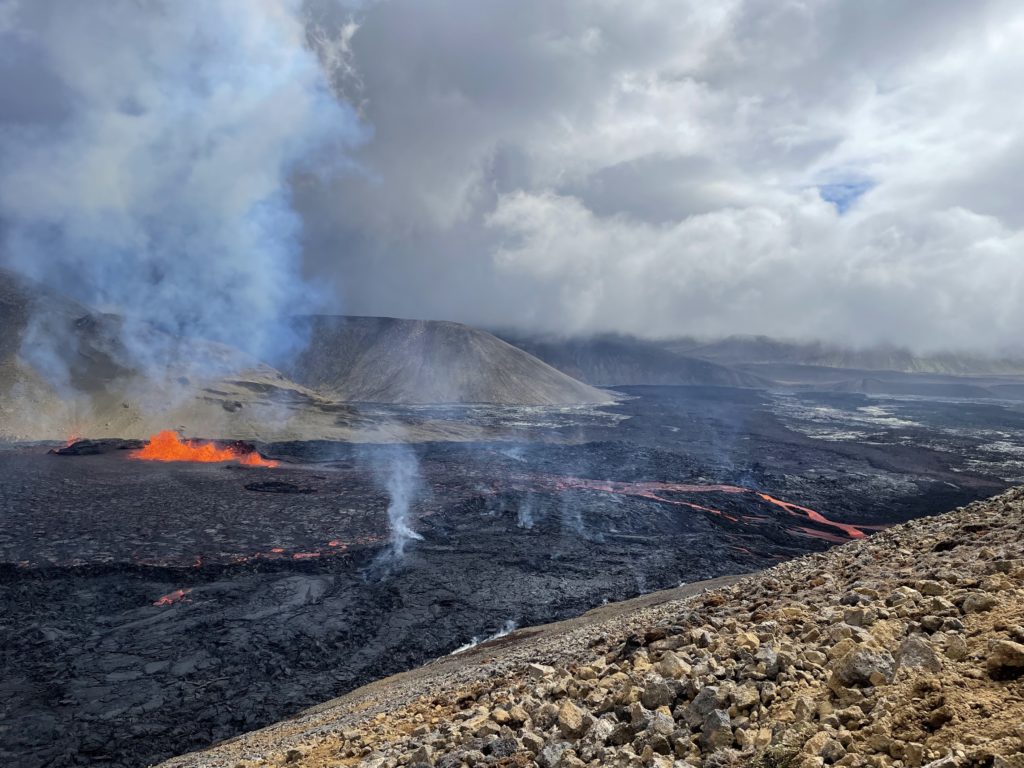 The eruption site at Meradalir valley on the Reykjanes peninsula in Iceland. This image accompanies an article on how to safely visit the volcano erupting in Meradalir.