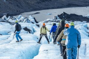 Einar Samuelsson making sure that everybody in his group cross a glacial crevice safely.