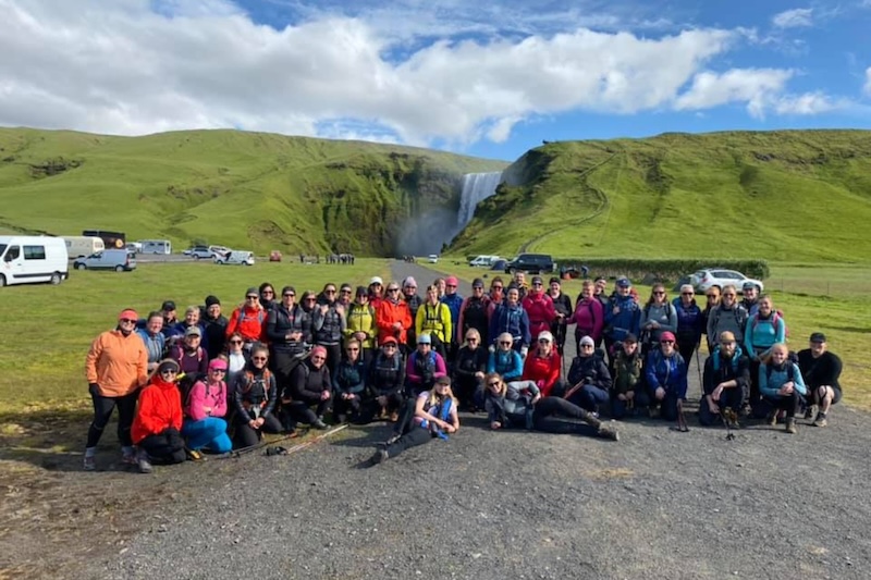 A group of Midgard guests at the stunningly beautiful hiking trail of Fimmvorduhals. The waterfall in the background is Skogafoss.