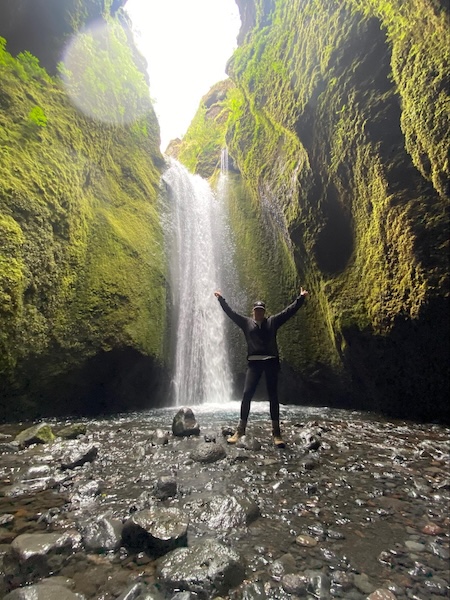 Karen shows her appreciation for Nauthúsagil waterfall.