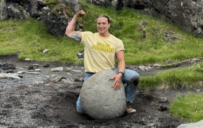 Sanda "Sunny" Bradley with one of the lifting stones in Iceland.