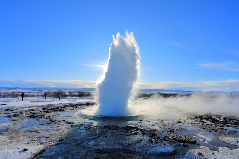 Strokkur geyser on the south coast of Iceland erupts in winter