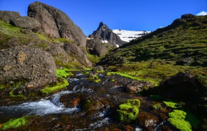 The boulders, peaks and crystal clear rivers and lakes of magical Stórurð valley, East Fjords, Iceland