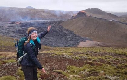 Rebecca Kent demonstrates the incredible amount of lava generated by one of the recent eruptions on the Reykjanes peninsula.