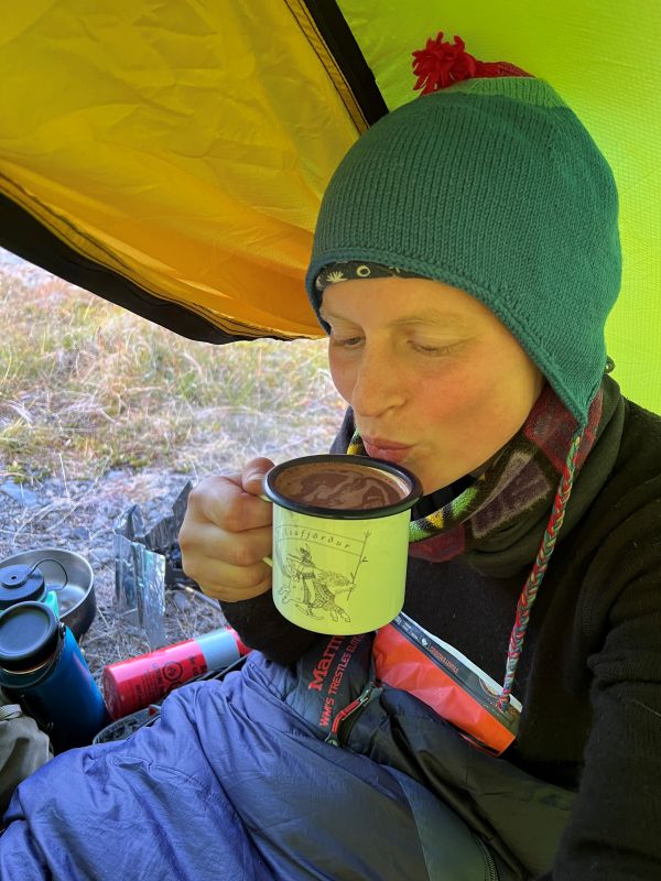 Katharina Kneip enjoys a hot beverage age on a cold morning in Iceland.